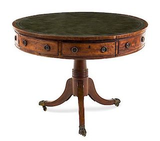 * A Regency Mahogany Drum Table Height 29 x diameter of top 38 inches.