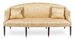 * A Regency Style Mahogany Sofa Height 38 3/4 x width 81 inches.