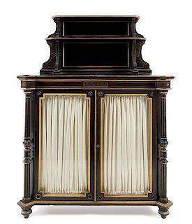 * A Victorian Parcel Gilt Ebonized Cabinet Height 55 1/2 x width 38 x depth 20 1/4 inches.