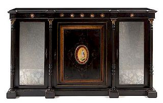 A Victorian Ebonized Wood and Porcelain Mounted Sideboard Height 40 1/2 x width 68 1/2 x depth 16 1/4 inches.