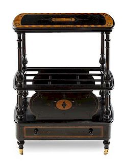 An Aesthetic Movement Ebonized and Marquety Inlaid Canterbury Height 33 1/2 x width 25 1/2 x depth 16 inches.