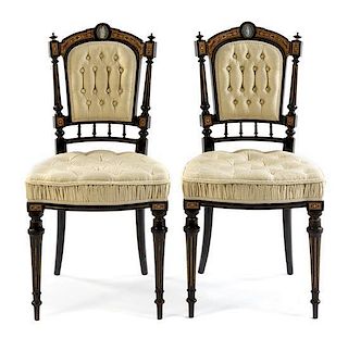 A Pair of Aesthetic Movement Parcel Ebonized Side Chairs Height 33 3/4 inches.
