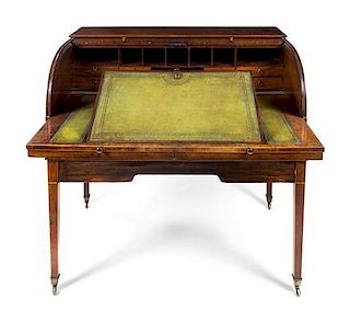 An English Mahogany Cylinder Desk Height 40 1/4 x width 42 x depth 30 1/4 inches.