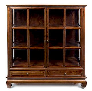 A British Colonial Style Vitrine Cabinet Height 54 x width 48 x depth 16 inches.