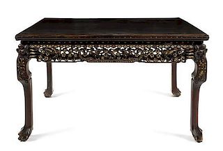* A Chinese Export Mother-of-Pearl Inlaid Hardwood Table Height 29 1/2 x width 51 3/4 x depth 35 inches.