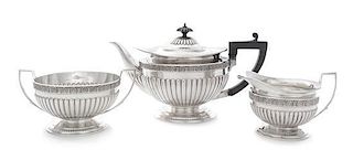 A George V Silver Three-Piece Tea Service, Goldsmiths & Silversmiths Co. Ltd., London, 1912, comprising a teapot, a creamer a