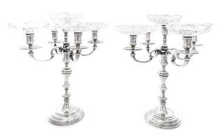 A Pair of English Silver Five-Light Candelabra, Charles & Richard Comyns, London, 1923, having a central urn form candle cup 