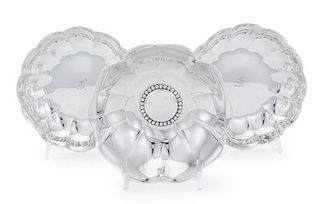 * A Group of Three American Silver Dishes, Tiffany & Co., New York, NY, comprising a pair having an undulating rim with a rib