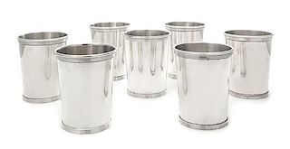 A Set of Seven American Silver Julep Cups, Newport Sterling, Providence, RI, each having a banded rim and base.