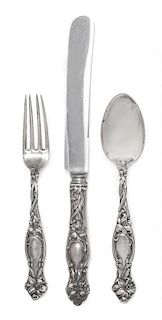 * An American Silver Flatware Service, Simpson, Hall, Miller & Co., Wallingford, CT, Frontenac Lily pattern, comprising: 9 di