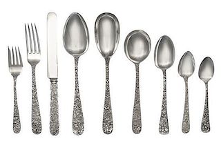 An American Silver Flatware Service, S. Kirk & Son, Baltimore, MD, Repousse pattern, comprising: 6 dinner knives 6 luncheon k