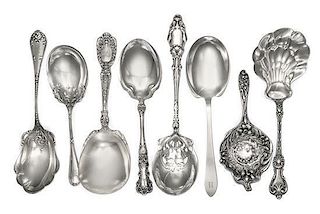 * A Collection of American Silver Serving Articles, Various Makers, comprising serving spoons, forks, tongs and a cake slice.