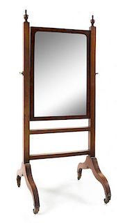 A Federal Mahogany Cheval Mirror Height 55 5/8 x width 22 5/8 inches.