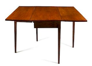 * An American Maple Drop-Leaf Table  Height 28 x width 48 x depth 18 1/2 inches.