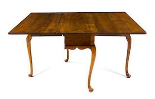 * An American Tiger Maple Drop-Leaf Table Height 29 x width 48 x depth 18 inches (closed).