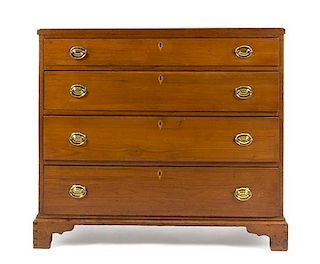 * An American Cherry Chest of Drawers Height 39 1/2 x width 44 1/4 x depth 19 1/4 inches.