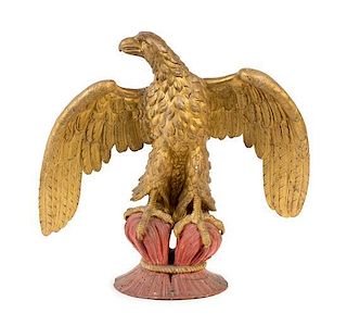 * A Carved Giltwood Model of an Eagle Height 22 1/2 x width 24 inches.