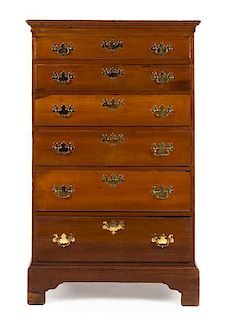 * An American Cherry Tall Chest of Drawers Height 60 1/2 x width 37 1/2 x depth 19 1/2 inches.