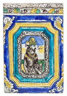 * A Qajar Molded Pottery Tile 18 x 12 inches.