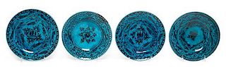 * Four Persian Pottery Plates Diameter 8 1/2 inches.