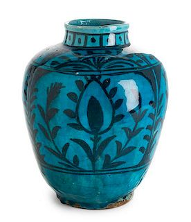 * A Persian Pottery Vase Height 10 3/4 inches.