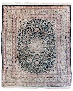 * A Persian Wool Carpet 10 feet x 8 feet 2 inches.
