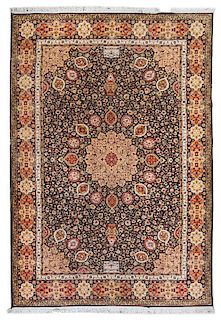 * A Tabriz Style Wool Rug 5 feet 6 inches x 9 feet 8 inches.