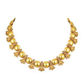 A Gold Necklace and Earrings Set