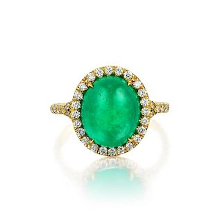A Diamond and Emerald Ring