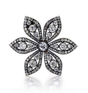 An Antique Diamond and Silver On Gold Flower Brooch