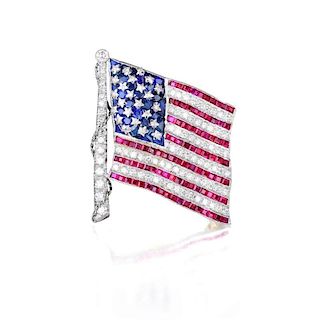 A Ruby, Diamond, and Sapphire American Flag Pin