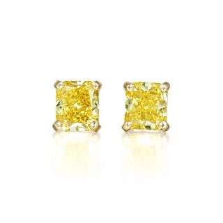 A Pair of Fancy Vivid Yellow Diamond Stud Earrings