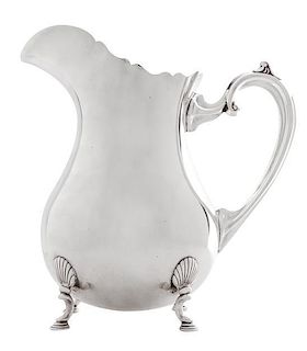 An American Silver Water Pitcher, Fisher Silversmiths Inc., Jersey City, NJ, of handled, footed form.