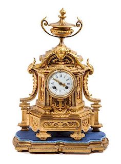 * A Continental Gilt Bronze Clock Height 18 1/2 inches.