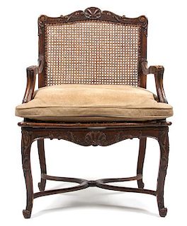 A French Provincial Armchair Height 36 1/2 inches.