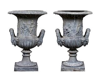 A Pair of Neoclassical Style Composite Urns Height 31 1/2 inches.