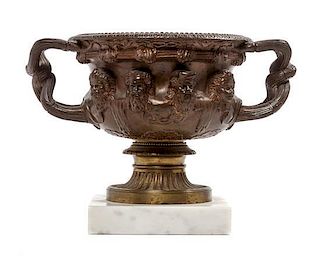 * A Continental Bronze Urn Height 6 inches.