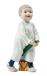 * A Meissen Porcelain Figure Height 7 inches.