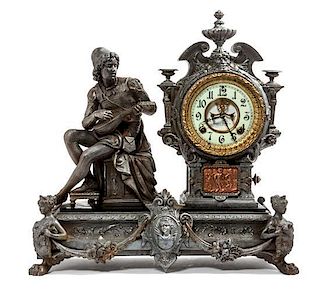 * A Cast Metal Figural Mantle Clock Height 19 1/2 x width 19 1/4 x depth 7 1/2 inches.
