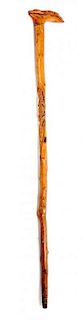 * A Carved Wooden Walking Stick Height 34 3/4 inches.