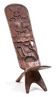 An African Carved Wood Folding Seat Height 38 inches.