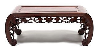A Chinese Carved Hardwood Low Table Height 10 1/2 x width 29 x depth 14 3/4 inches.