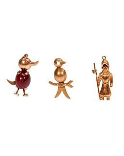 Group of 14k gold novelty brooches and pendant