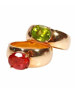 A pair of matching green and pink, 14k gold rings