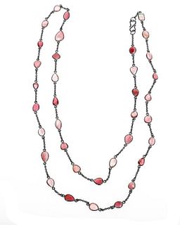 A pink tourmaline and blackened silver longchain