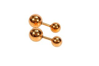 A pair of 14k gold double-sided cufflinks