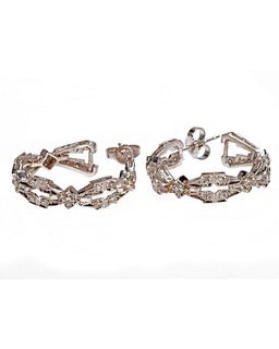 A pair of diamond and platinum hoop earrings