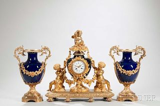 Three-piece Gilt-bronze-mounted Cobalt-ground Porcelain Clock Garniture