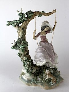 Lladro porcelain girl on swing