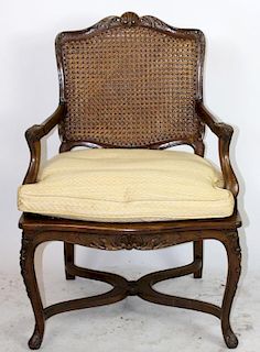 French Louis XV style cane armchair